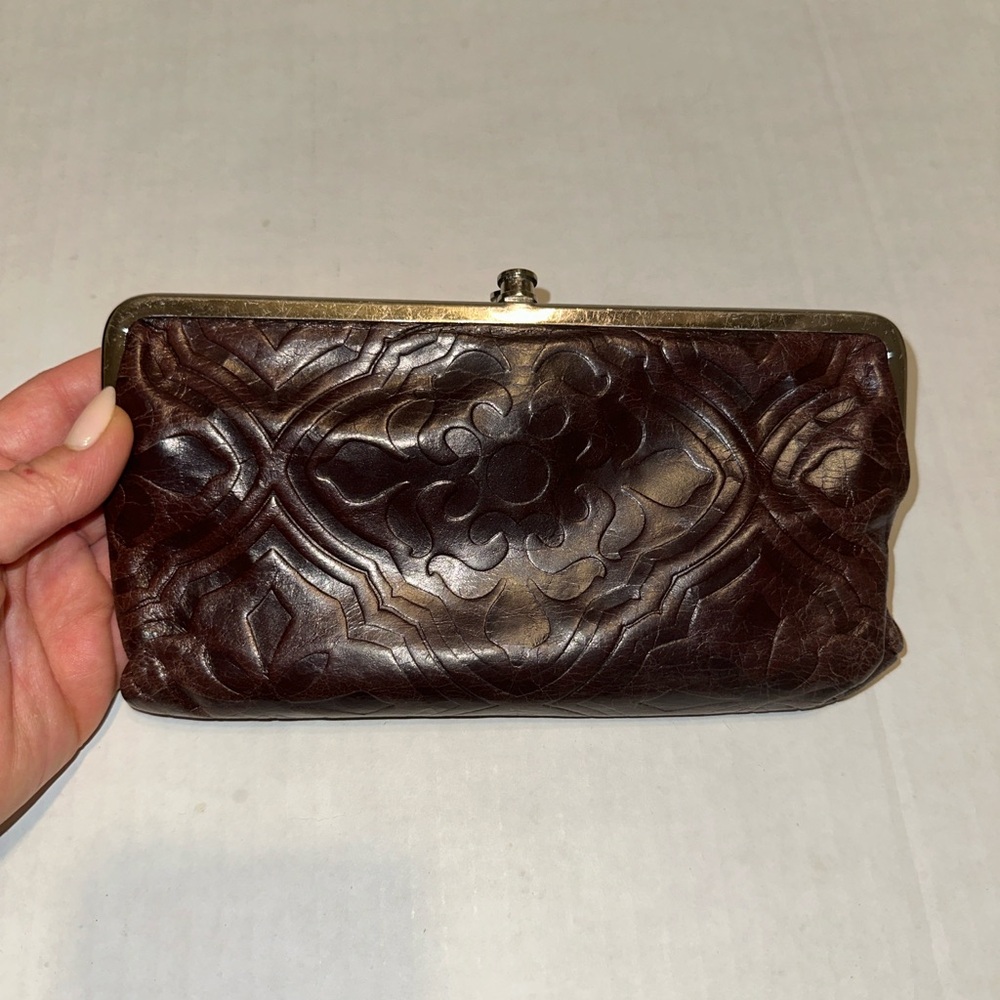 HOBO Brown Leather Clutch with Vintage Charm